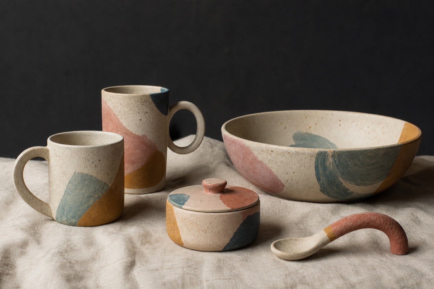 grouping of generic ceramic cups and vessels